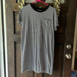Black & white striped dress, folded short sleeves and a small slit on each side